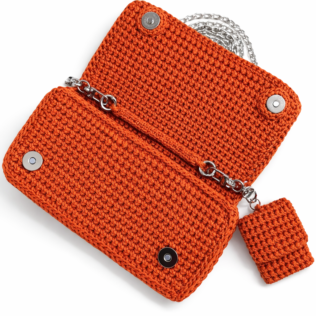 borsa uncinetto elegante Ava arancione aperta dettaglio interno e chiusura magnetica