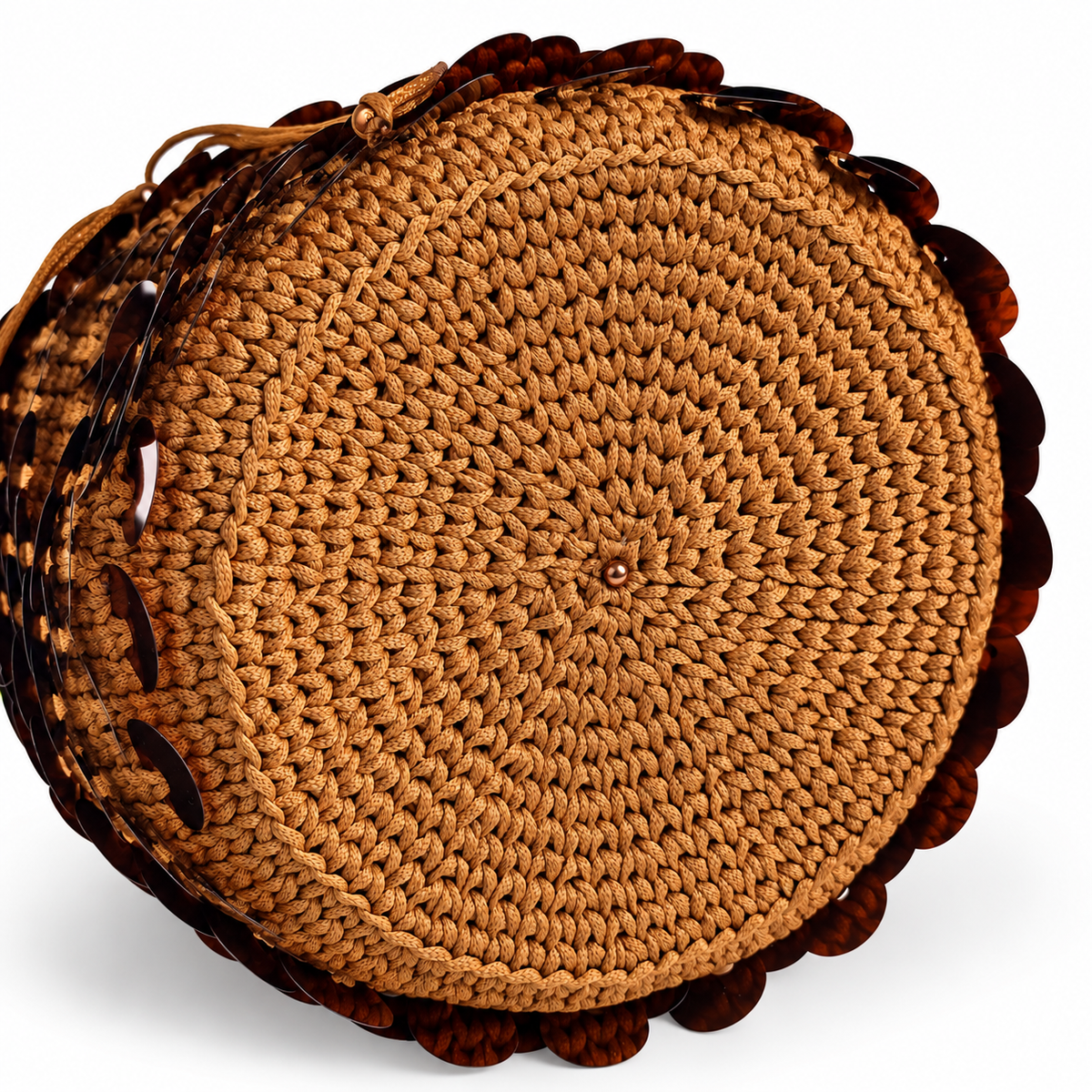 Dettaglio del fondo lavorato a crochet della borsa a secchiello Dafne