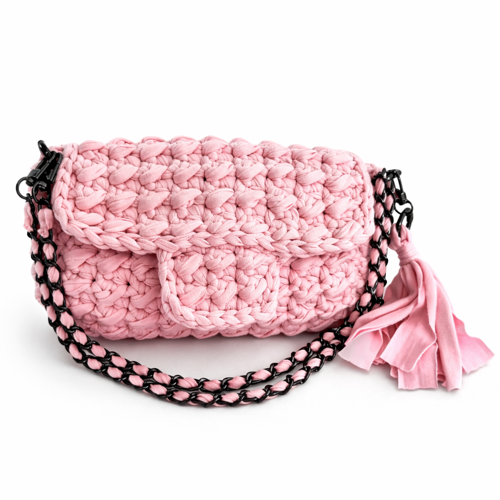 borsa uncinetto elegante Ella rosa con catena intrecciata e nappa