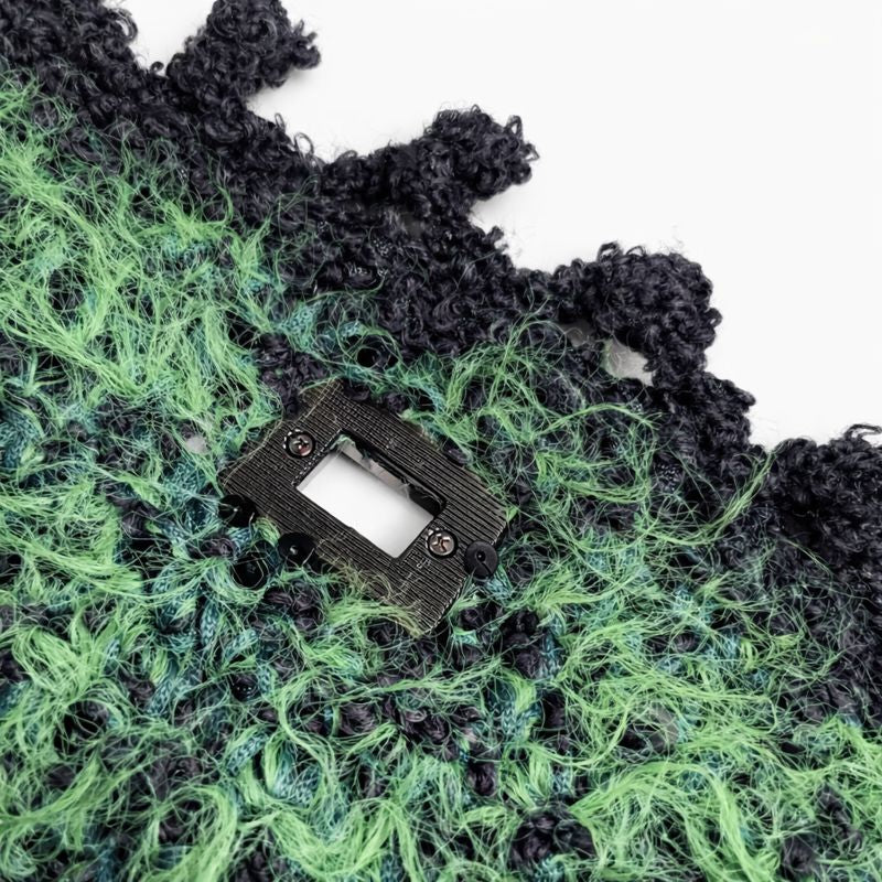 dettaglio chiusura interno borsa Nina nero verde uncinetto