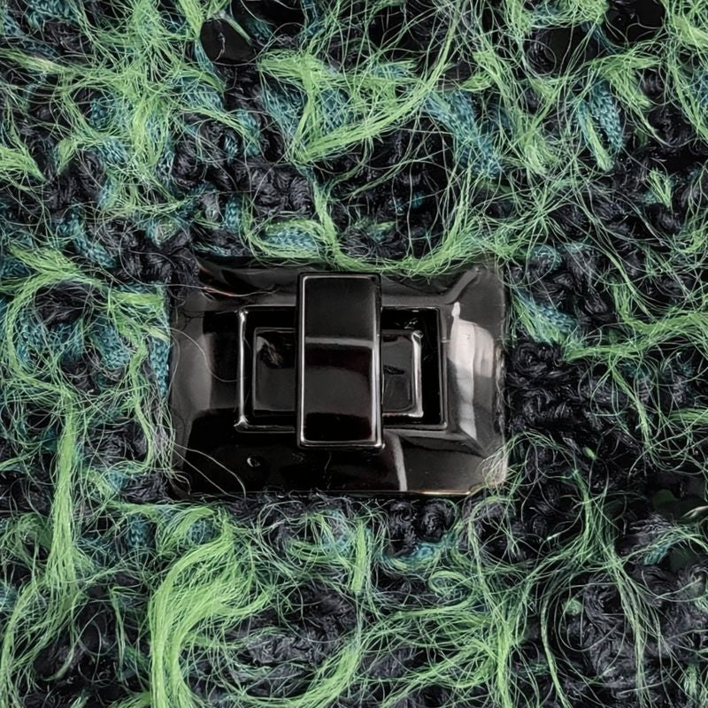 dettaglio chiusura borsa Nina verde nero uncinetto